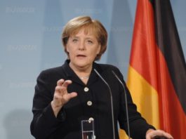 Euro Slides on German Chancellor News