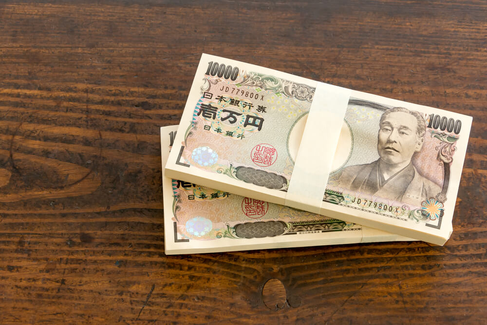 Japanese yen stacked banknotes closeups