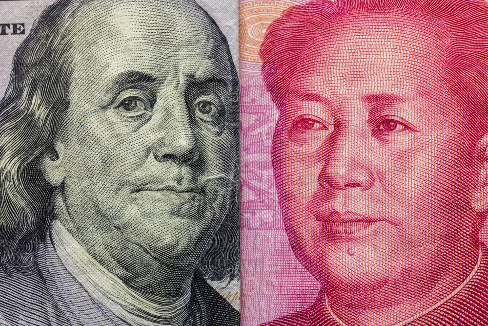 USD to CNY: Chinese yuan and US dollar bills
