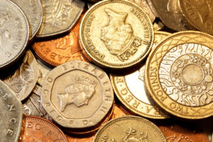 GBP/USD: British pound sterling coins.