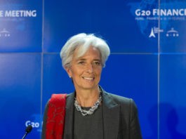 Christine Lagarde with blue background.