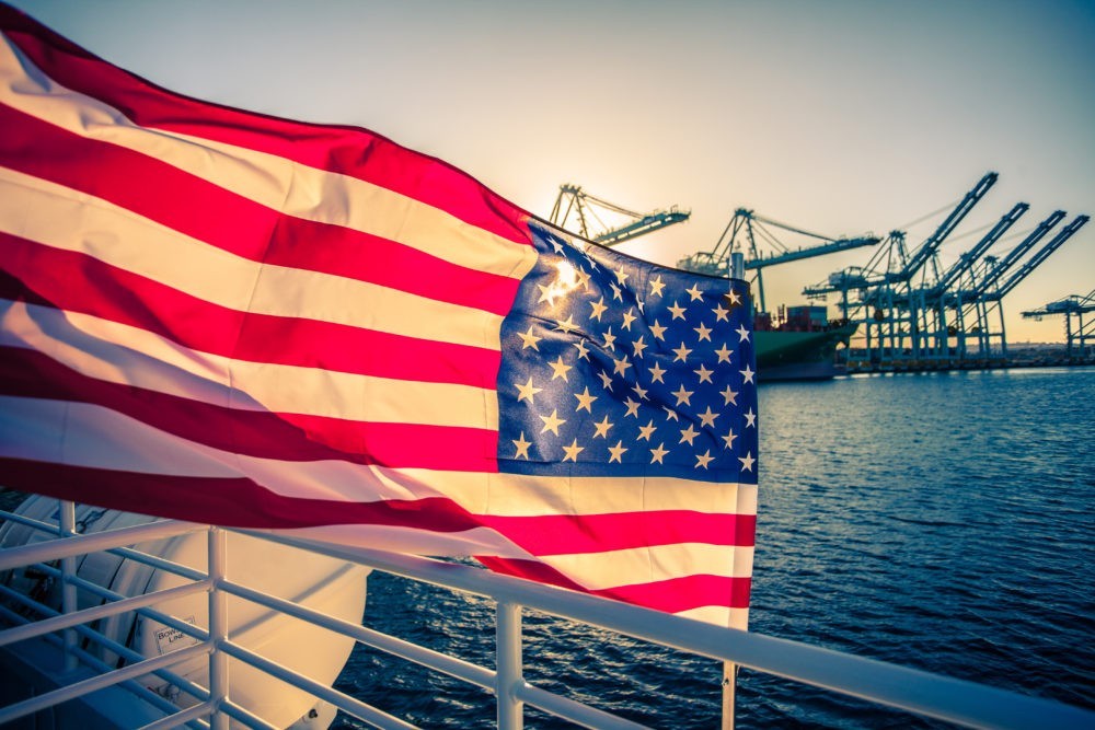 US flag over port