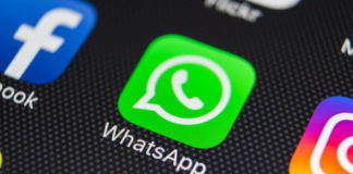 WhatsApp: WhatsApp messenger application icon on smartphone screen close-up.