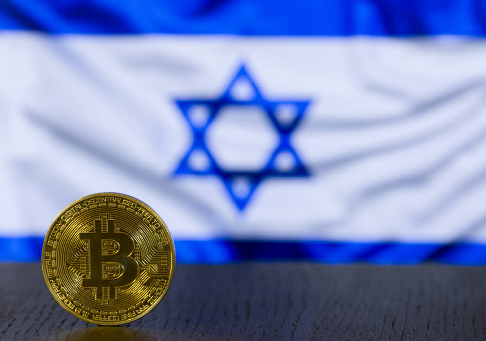 Digital Coins: Bitcoin golden coin with Israel flag in the background
