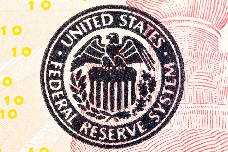 closeup shot of the US Fed seal – WibestBroker 