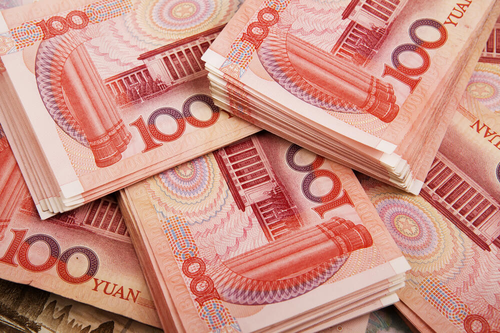 Wibest – USD to CNY: A pile of 100-yuan bills.