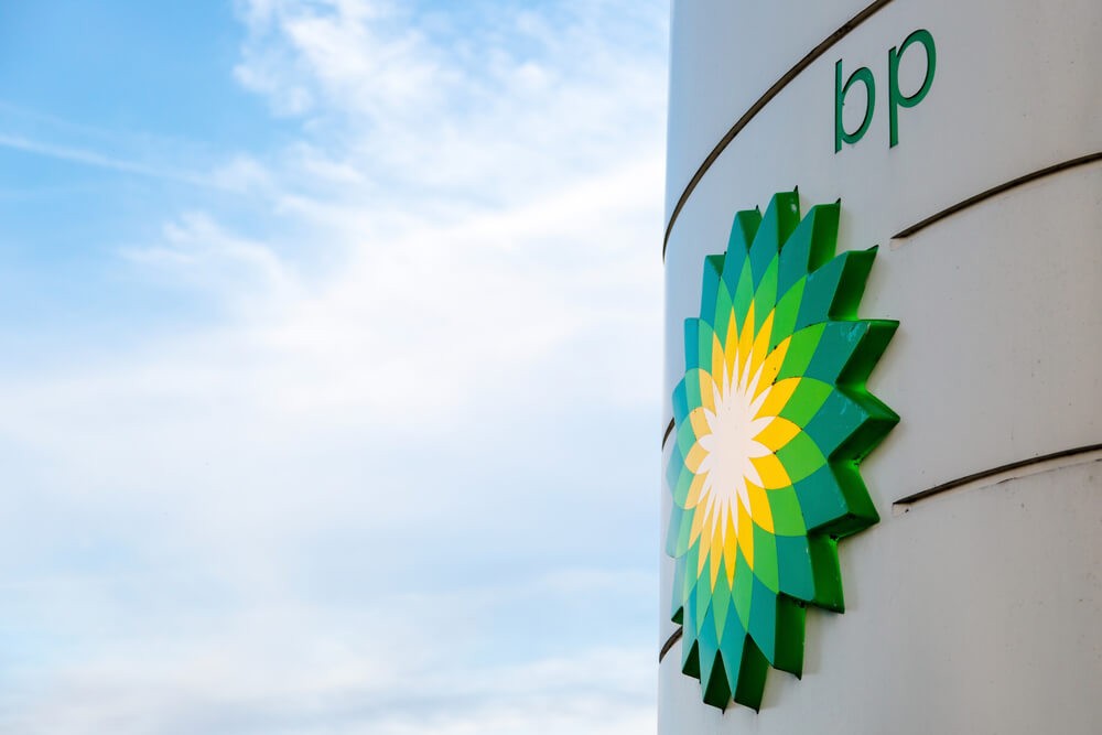 BP: BP display stand with company redesign logo in blue sky background.