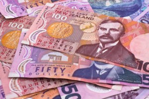 Wibest – NZD USD: New Zealand dollar bills.