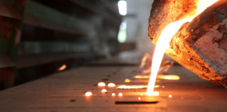 Wibest – Gold and Silver Prices: Molten metal poured from a crucible.