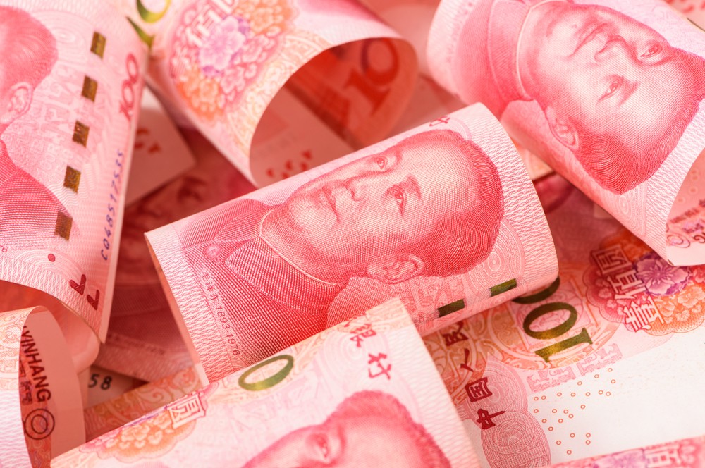 Chinese Yuan traded steady while the Aussie was flat