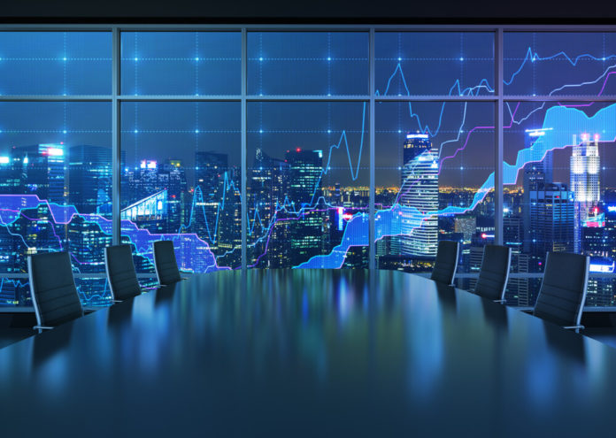 Asian stock Market: Forex graph and an amazing night view of the business city area.