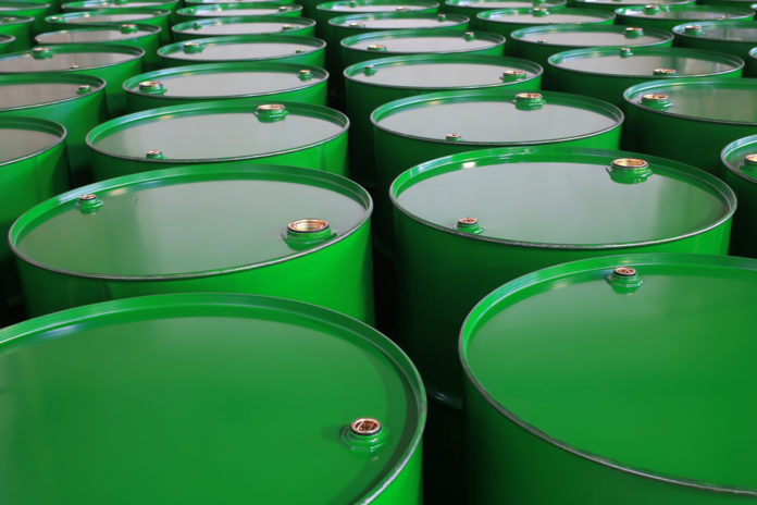 Wibest – EIA: Green metal crude oil containers.