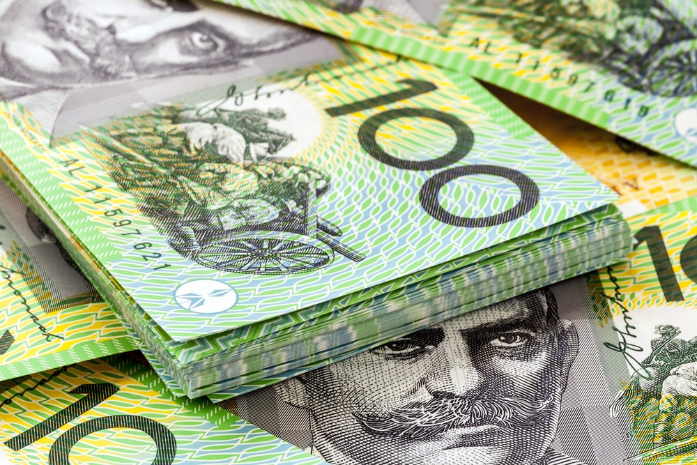 Wibest – GBP AUD: A stack of hundred Australian dollar bills.