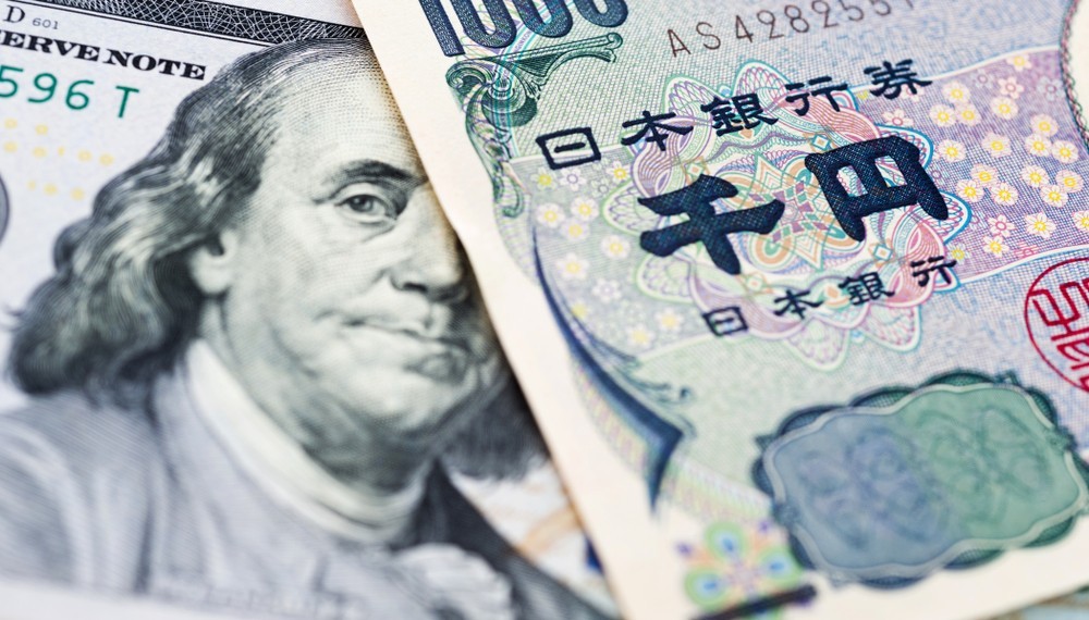 Wibest – Japan yen and US dollar bills.