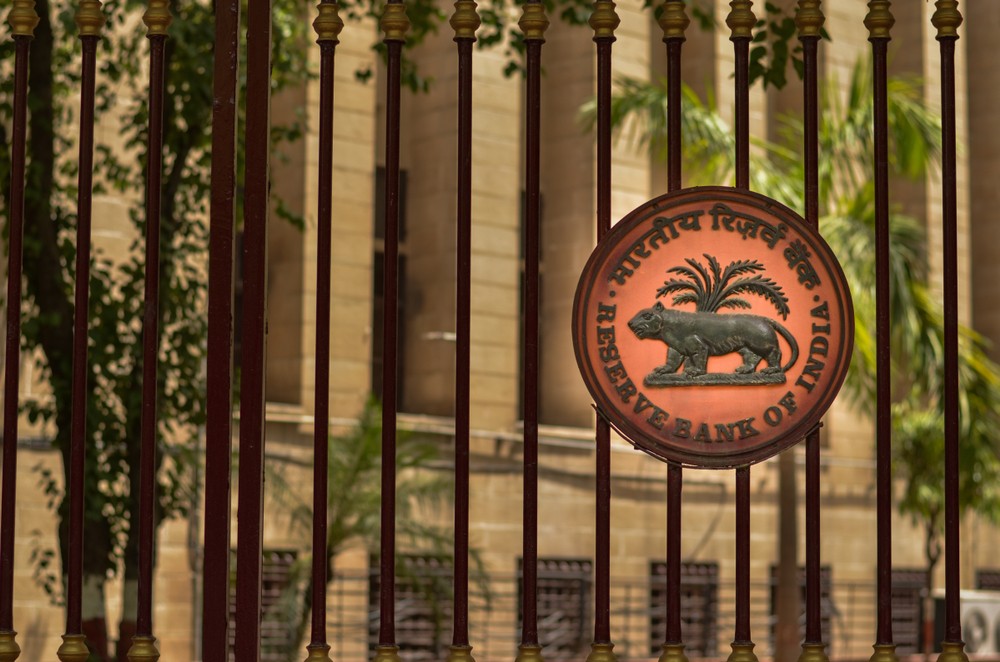 Wibest – Reserve Bank of India: The logo of the RBI on its gate.