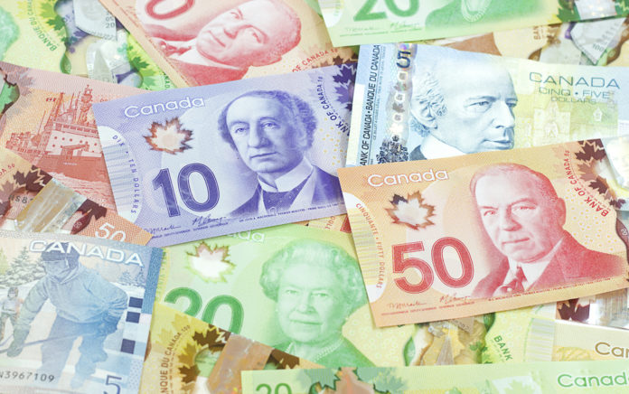 Canadian dollar boosts on improved risk appetite