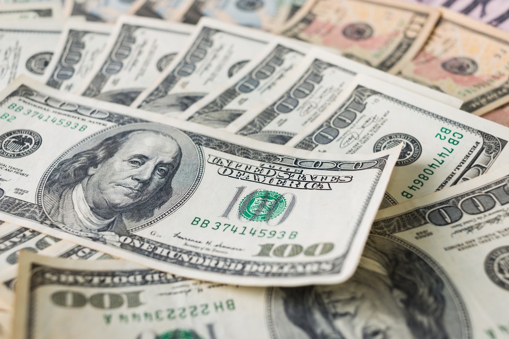 Wibest – The Greenback: US dollar bills.