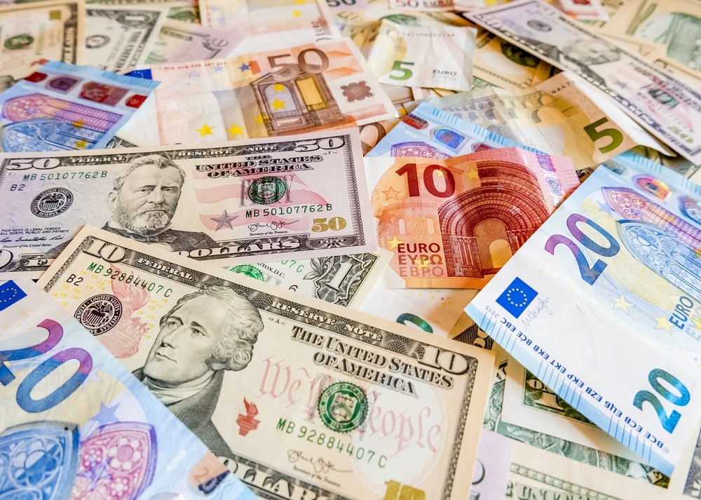 Wibest –Eurozone: Euro and US dollar bills.