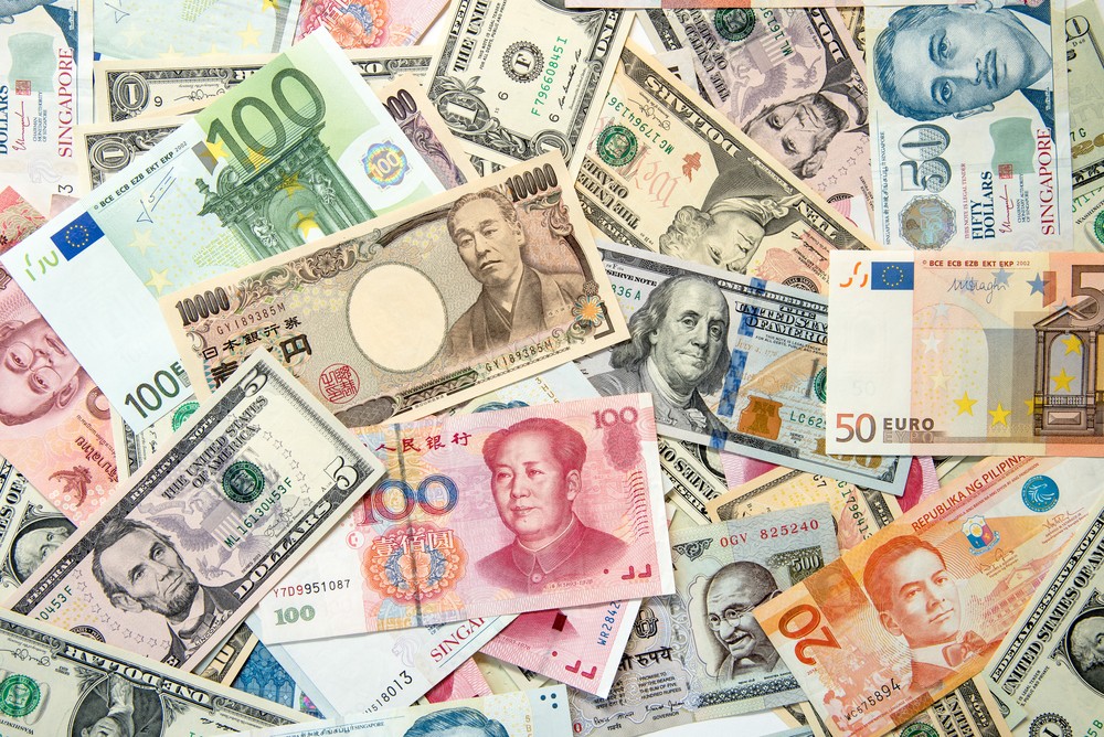 Wibest – Monetary Policy: Different banknotes from different countries.