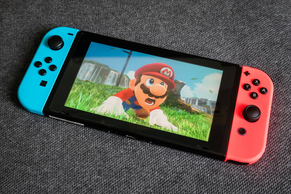 Mario: Nintendo Switch showing its screen with Super Mario.