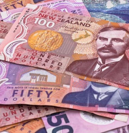 NZD/USD - New Zealand dollar bills.