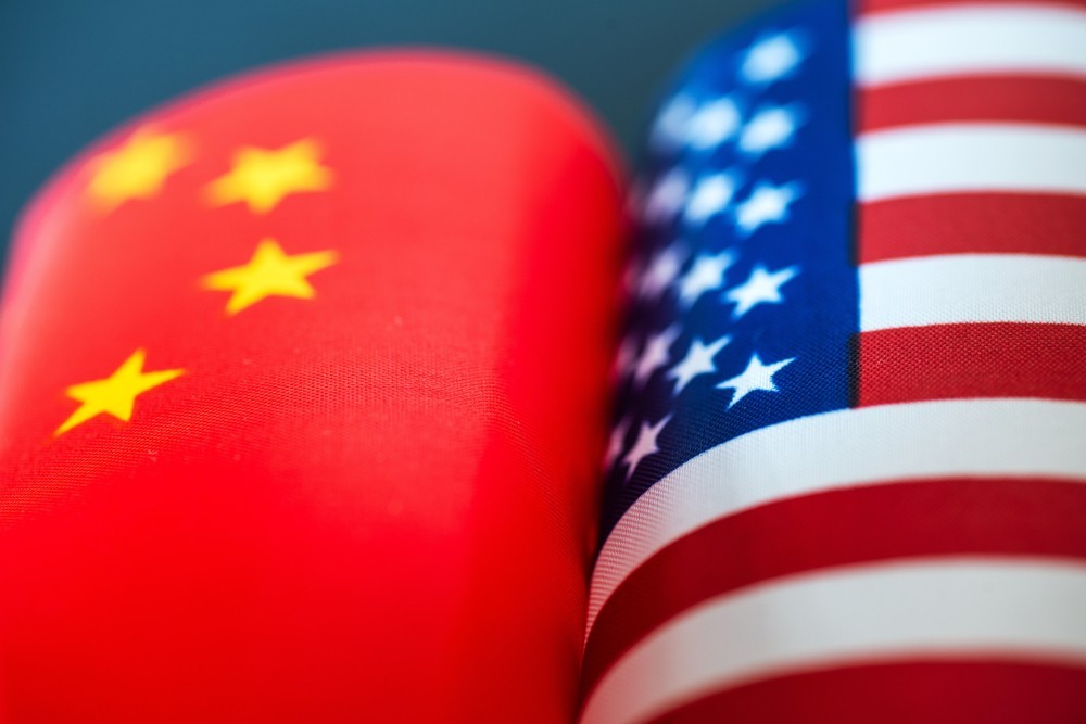 Wibest – Oil Petroleum: Chinese and American flags.