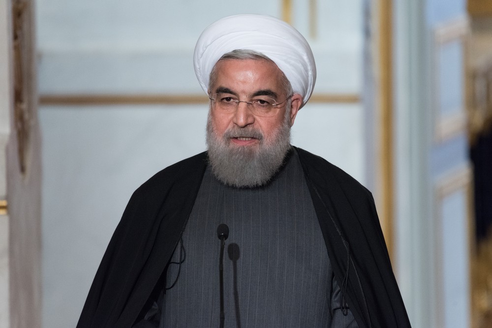 Wibest – United States: Iranian President Hassan Rouhani in front of a podium.