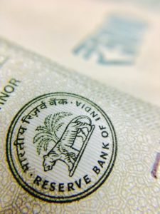Wibest – Rupees: The seal of the Reserve Bank of India on an Indian rupee banknote.
