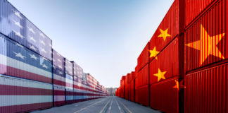 Wibest – Oil and petroleum: A concept art of the US-China trade war, with the American and Chinese flag painted on export crates.