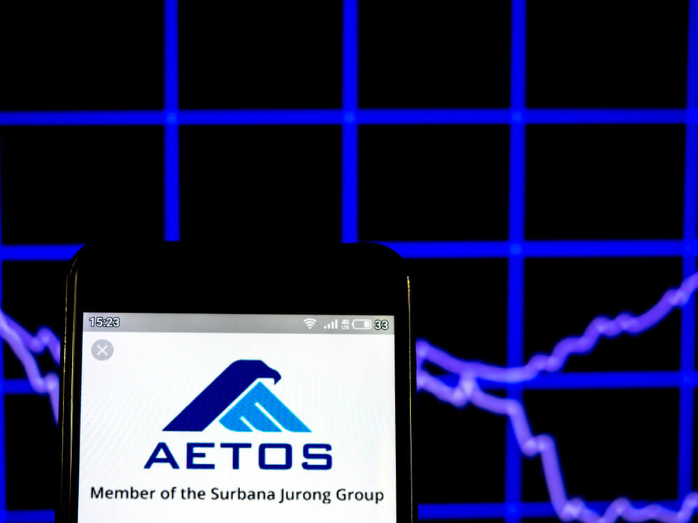 In this photo illustration an Aetos Security Management logo seen displayed on a smart phone.