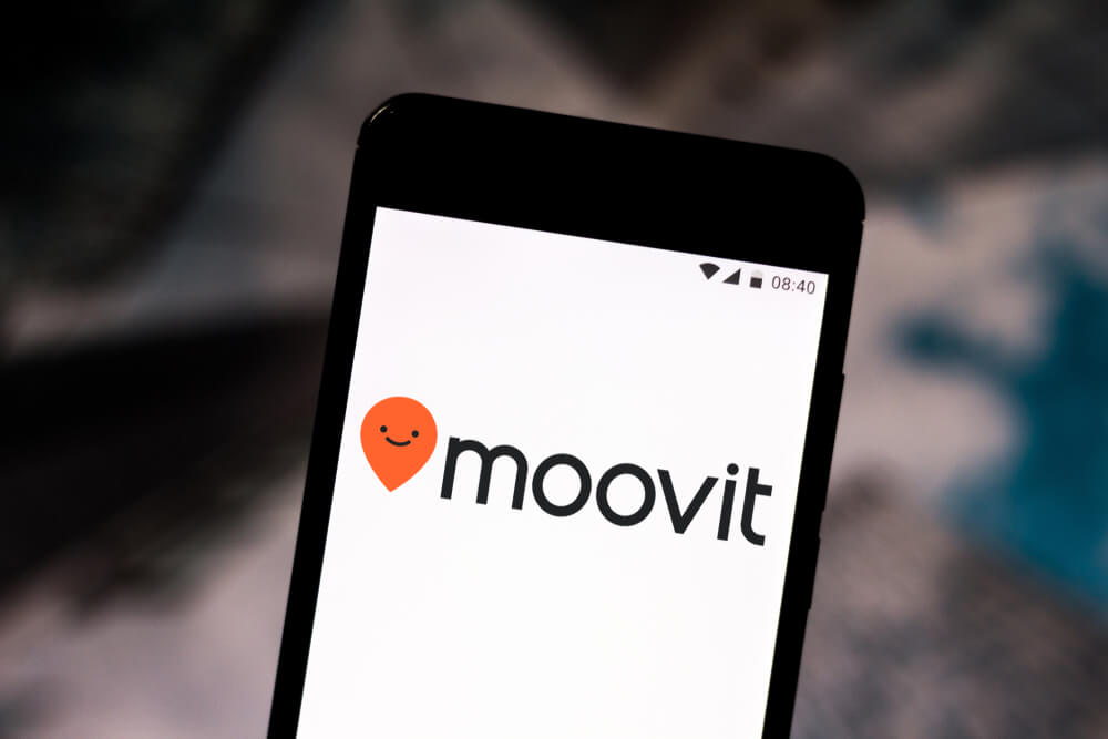 The Moovit logo is displayed on a smartphone.