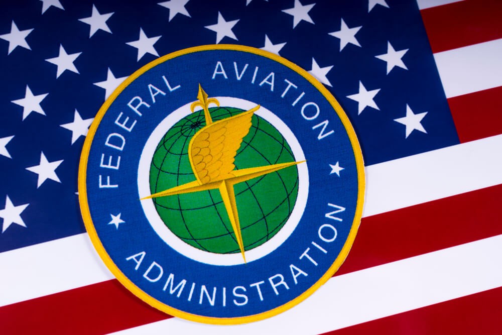 The symbol of the Federal Aviation Administration portrayed with the US flag.