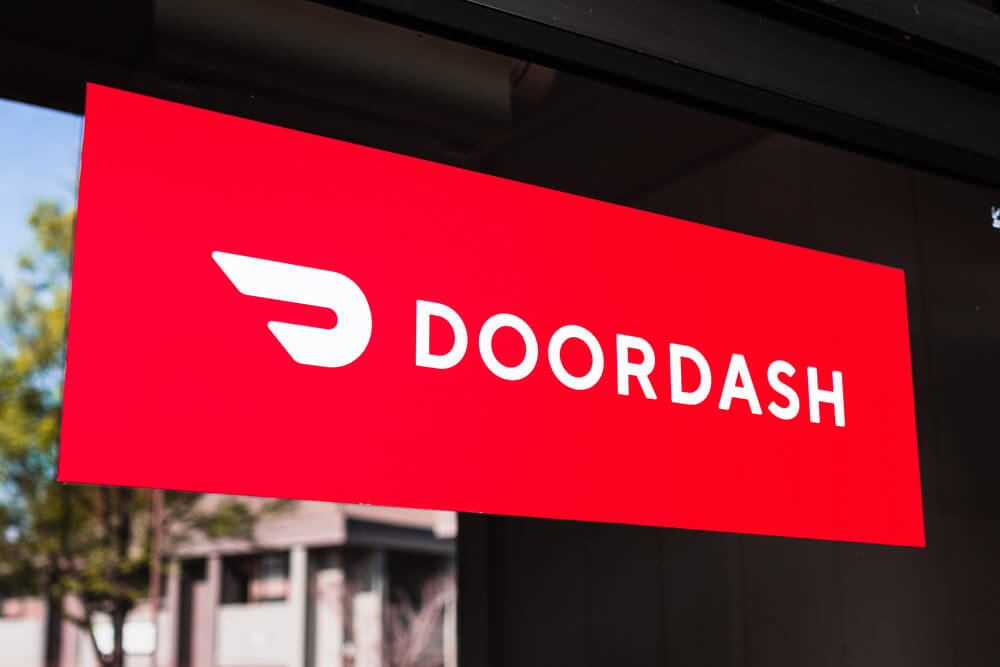 Close up of Doordash logo and symbol displayed at the entrance.