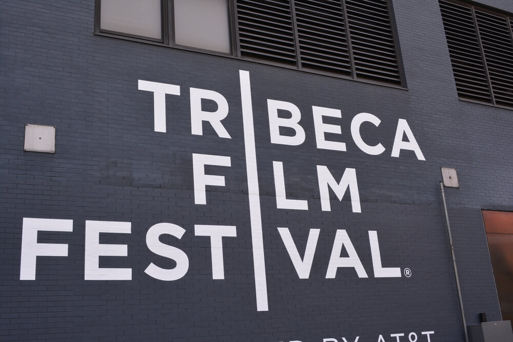 Sign painted on a building, landmark "Tribeca Film Festival"