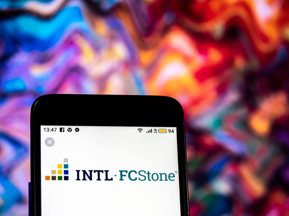 INTL FCStone Financial services company logo seen displayed on smart phone.