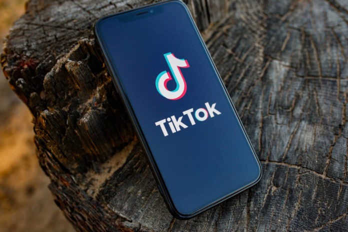 Tik Tok application icon on smartphone