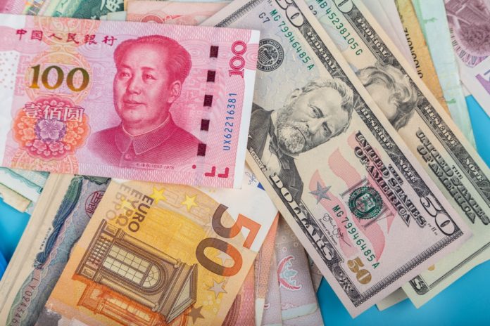 The Yuan Weakening As The Dollar Rises After The Fed Minutes