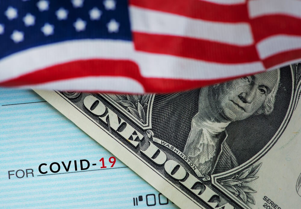 U.S. economy, retail sales, US flag and US dollar with Covid-19 text..