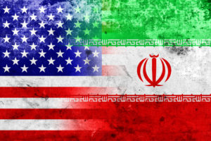 Tehran: Iranian and American flags.