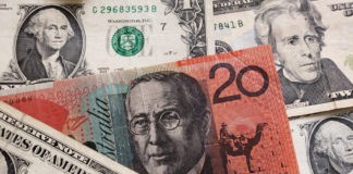 The Greenback: US dollar and Australian dollar banknotes.