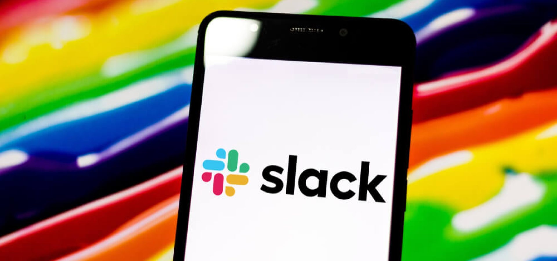The Slack logo displayed on an Android phone.