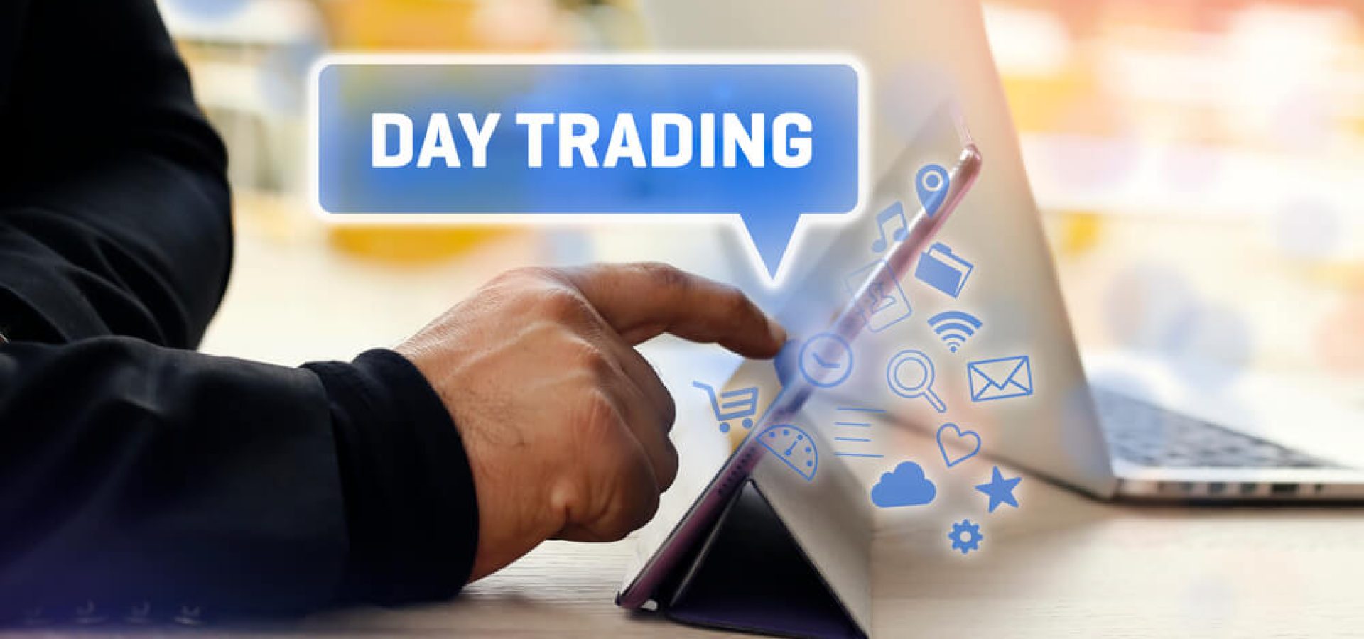 Wibest Broke r- Day Trader: Day trading concept hand looking at a laptop