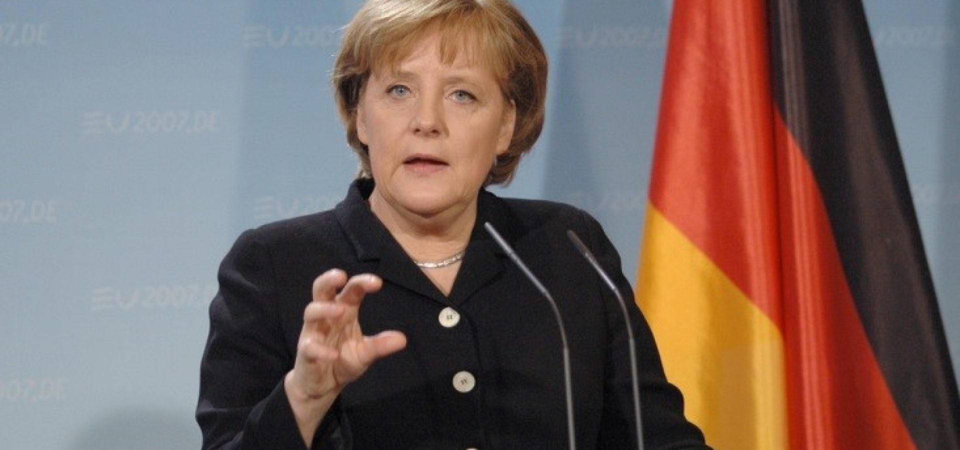 Euro Slides on German Chancellor News