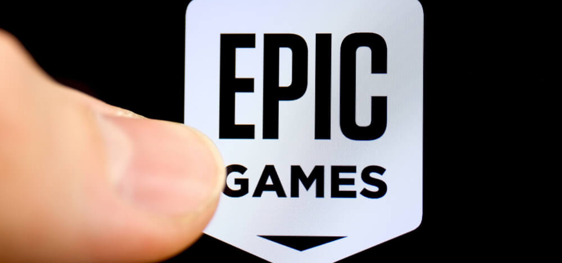 American company Epic Games on the smartphone with finger.