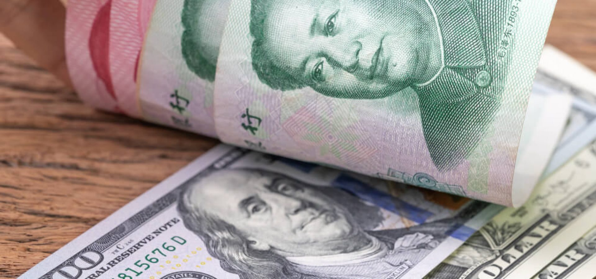 Asian Market: US dollar banknotes face up to Chinese Yuan banknotes