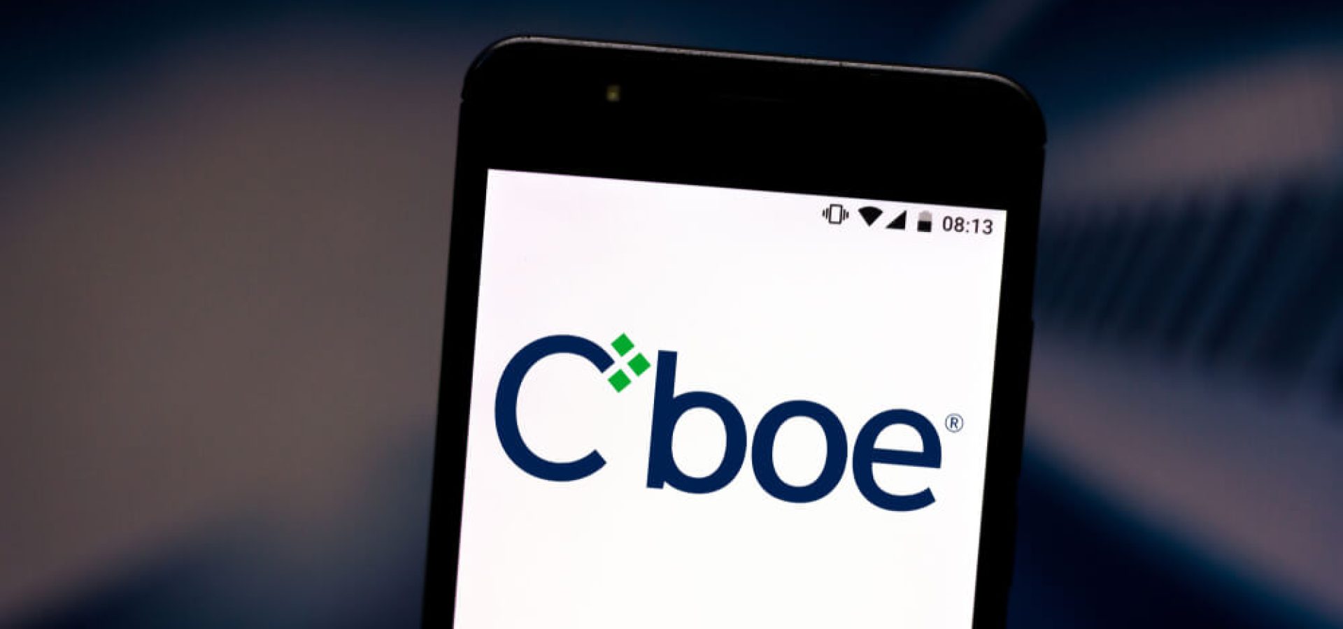 In this photo illustration the CBOE logo is displayed on a smartphone.