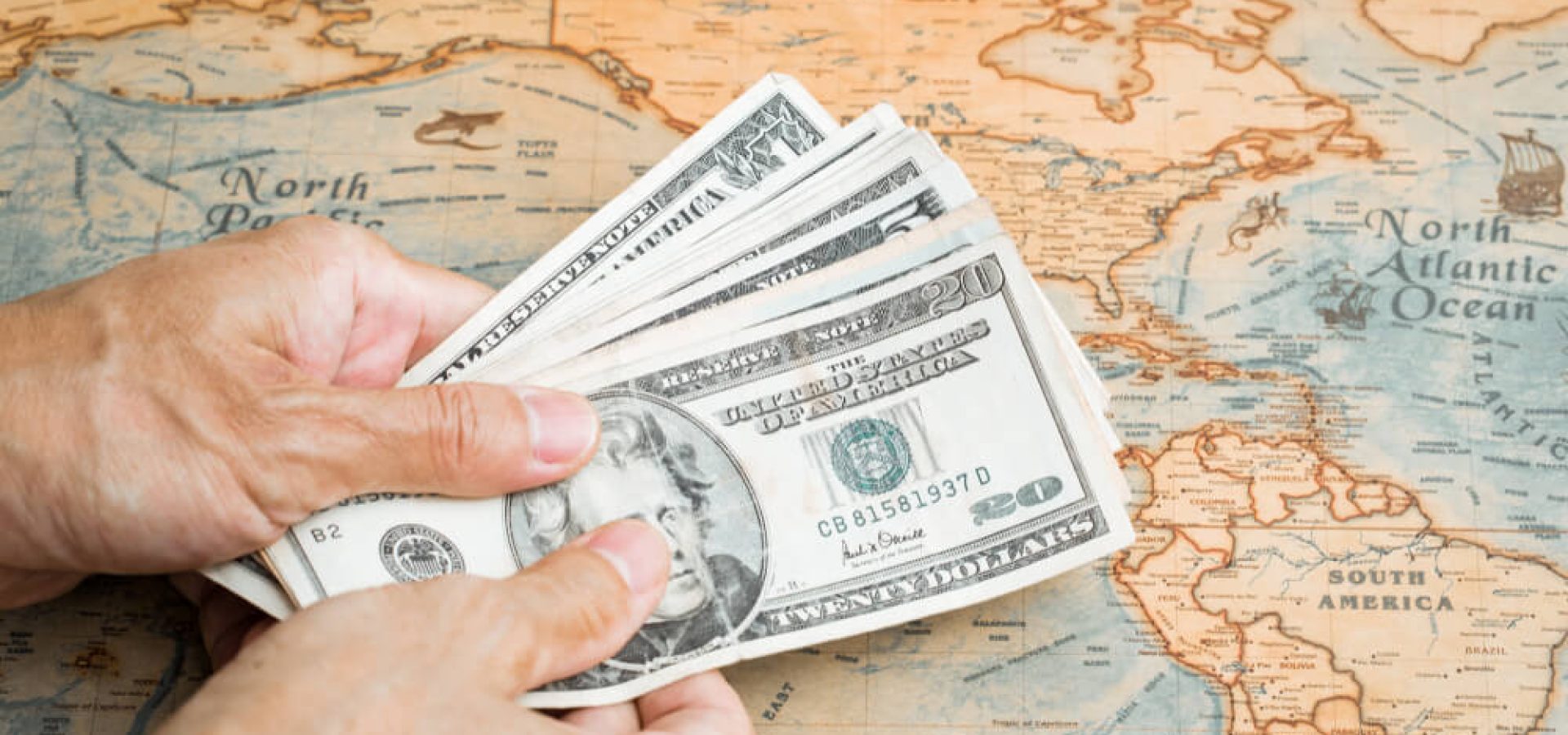 US dollar with map background.