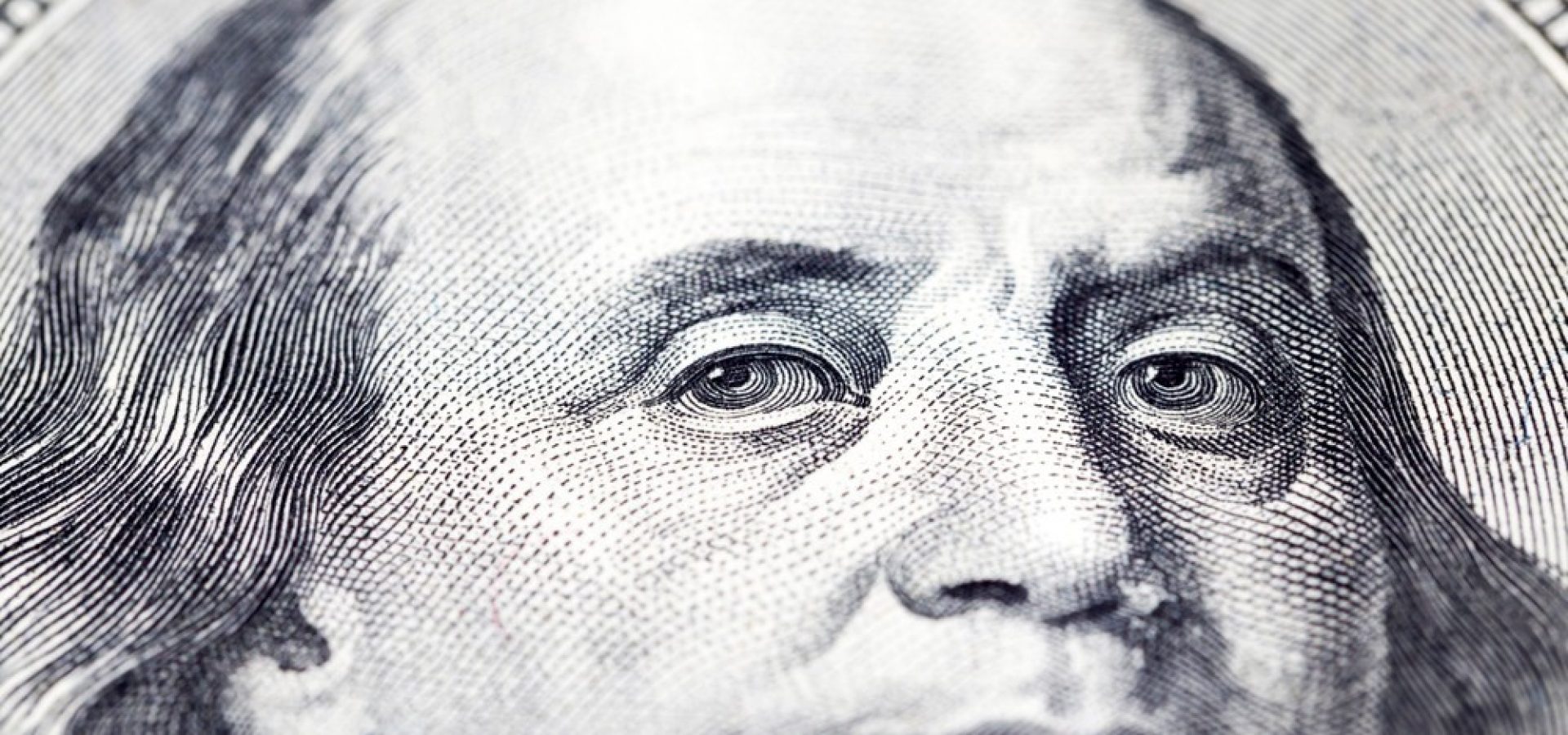 Wibest – Dollar: A close up of a US dollar bill.
