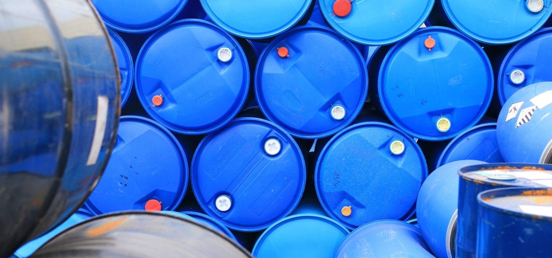 Wibest – Oil and Petroleum: Crude oil barrels stacked up.