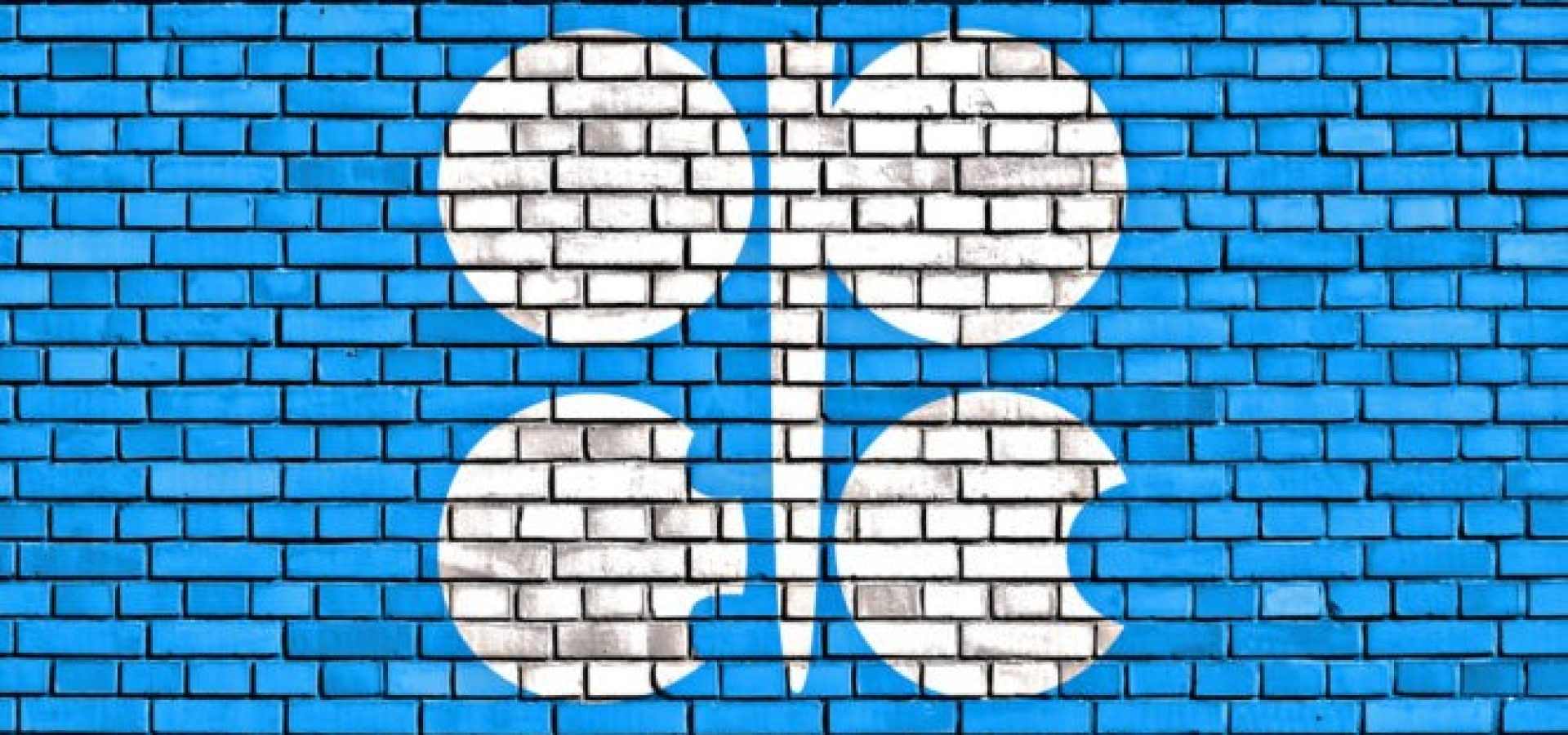 Wibest – Oil Petroleum: The OPEC's logo on a brick wall.